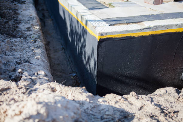Professional Emergency Waterproofing technician working in Dundee, NY